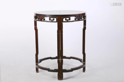 A ROSEWOOD CARVING ROUND TABLE