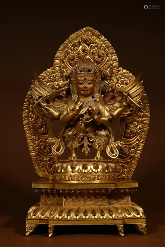 A GILT BRONZE BUDDHA FIGURE