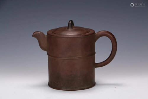 A ZISHA TEAPOT WITH HORIZONTAL MARKS