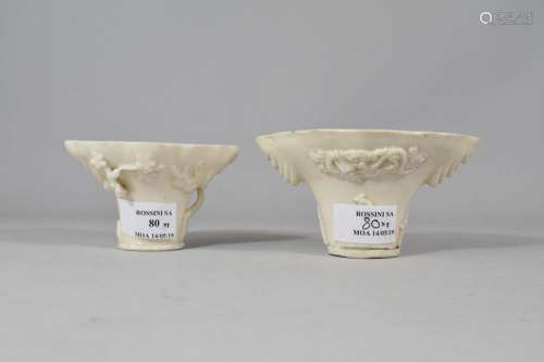 Two libation cups in white Chinese porcelain decor…