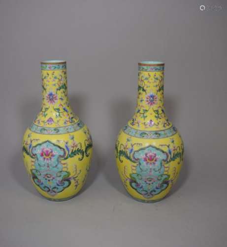 Pair of long neck porcelain vases with polychrome …