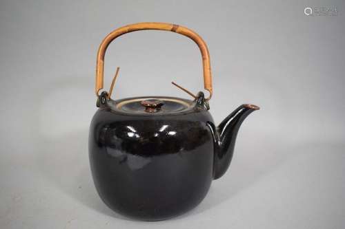 CHINA \nEnamelled stoneware teapot, bamboo handle.