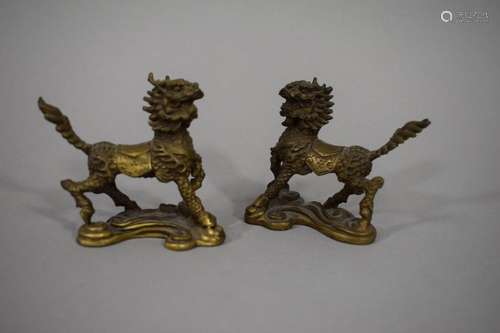 CHINA, 20th century \nPair of Fô dogs in partially …