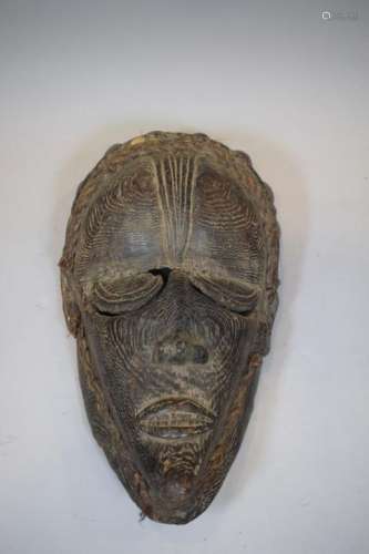 Wooden mask with a beautiful brown patina highligh…