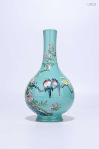 Qing Dynasty green glaze famille rose porcelain bottle