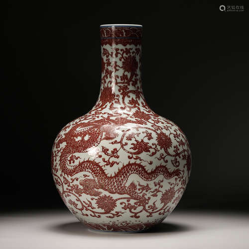 CHINESE IRON RED UNDERGLAZE DRAGON BOTTLE VASE