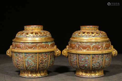 PAIR OF COPPER RED GLAZED ARCHAIC PATTERNED JARS WITH LIDS AND BEAST MASK HANDLES