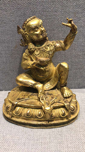 GILT BRONZE CAST 'GUARDIAN' SEATED FIGURE