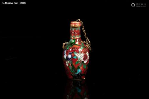 AN ENAMELED BRONZE 'FLOWER AND BIRD' SNUFF BOTTLE