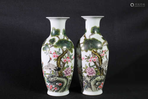 PAIR OF FAMILLE ROSE 'CRANES AND PINE TREES' VASES