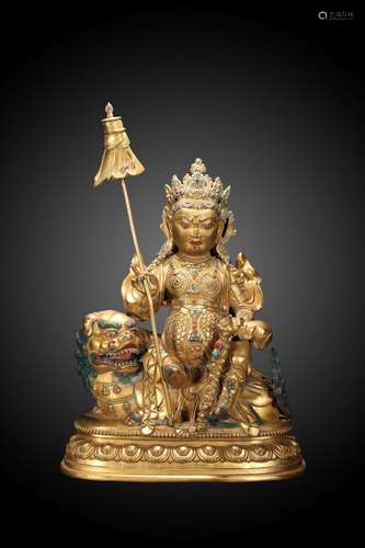 GILT BRONZE CAST VAISHRAVANA SEATED FIGURE