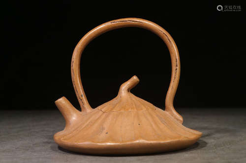 YIXING ZISHA CARVED AND 'LOTUS LEAF' TEAPOT WITH LIFTING HANDLE