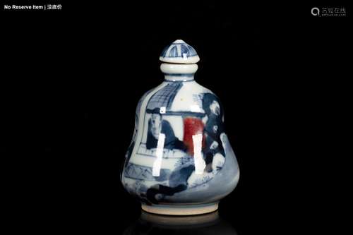 A BLUE AND WHITE AND IRON RED 'FIGURAL' SNUFF BOTTLE