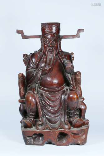 LONGYAN WOOD CARVED 'GOD OF WEALTH' SEATED FIGURE