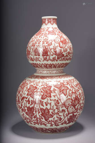 UNDERGLAZED RED 'FLOWERS AND FRUITS' DOUBLE GOURD VASE