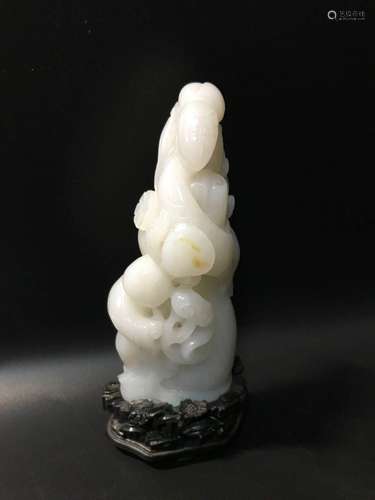 WHITE JADE CARVED 'MA GU' FIGURE