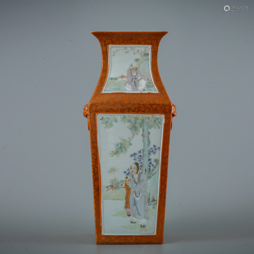 A square vase with a pattern of characters and sto…