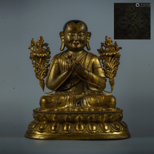 A gilt bronze Guru Buddha, Qing Dynasty