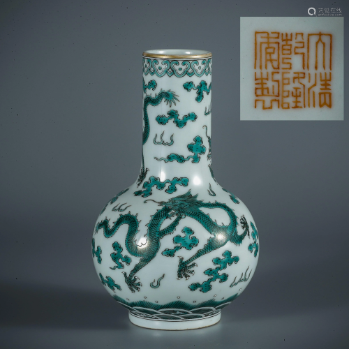 A green-glazed celestial vase with dragon de…