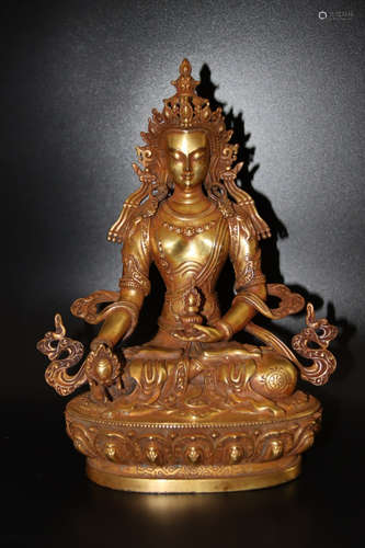 A Chinese Gilded Red Copper Buddha Statue