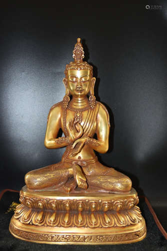 A Chinese Gilded Red Copper Buddha Statue