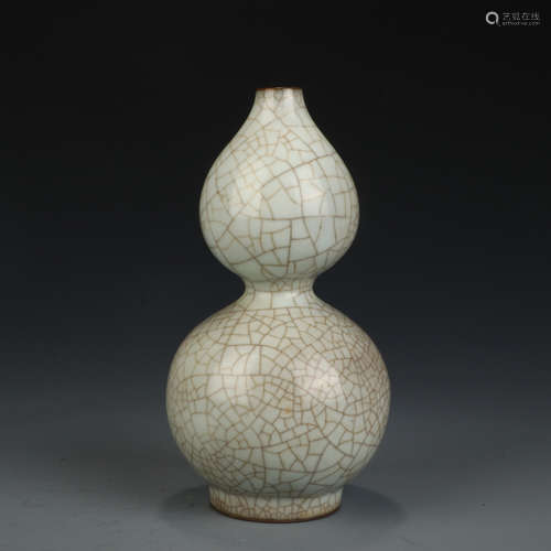 A Chinese Royal Kiln Moon White Glazed Porcelain Gourd-shaped Vase