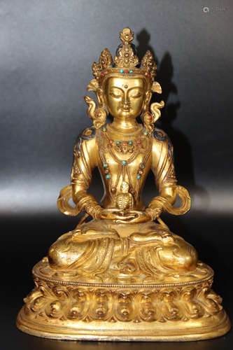 A Chinese Gilded Red Copper Buddha Statue