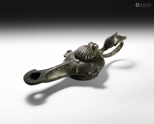 Roman Oil Lamp with Face and Dolphin