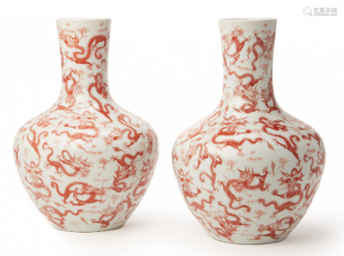 A PAIR OF LARGE IRON RED DRAGON VASES