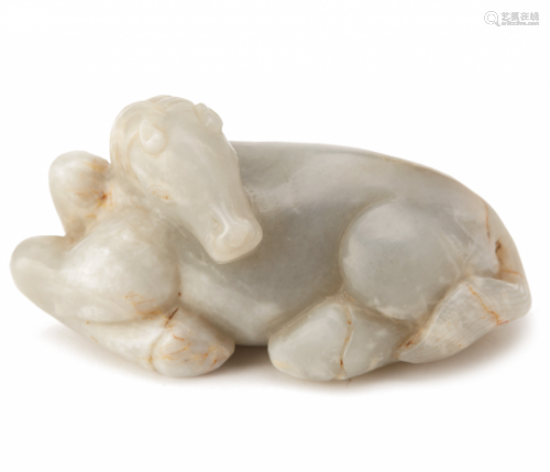 A CARVED JADE FIGURE OF A HORSE
