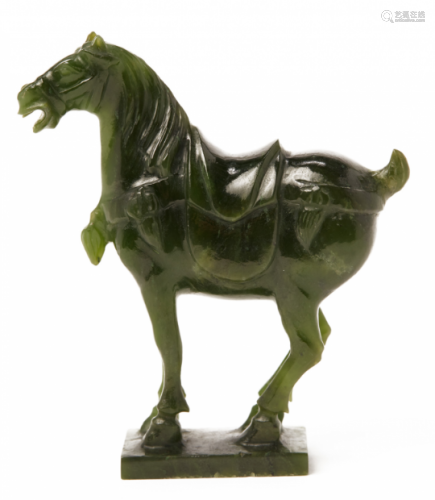 A CARVED JADE HORSE