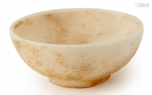 A SMALL INCISED WHITE STONE BOWL