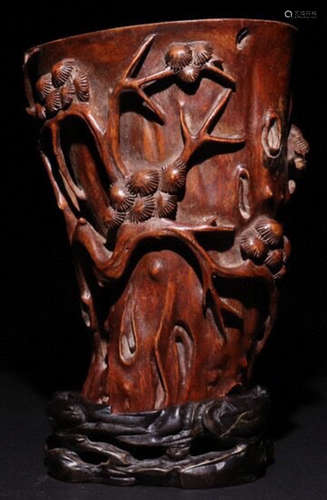 A HUANGHUALI WOOD CARVED CUP