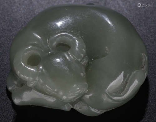 A HETIAN JADE CARVED COW SHAPED PENDANT