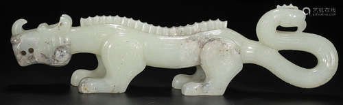 A HETIAN JADE CARVED TIGER SHAPED PENDANT