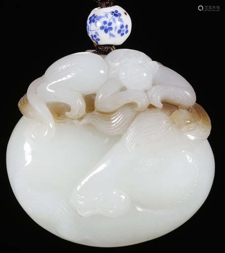 A XINJIANG HETIAN JADE CARVED HORSE SHAPE PENDANT