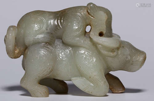 A HETIAN JADE CARVED BEAST SHAPE PENDANT