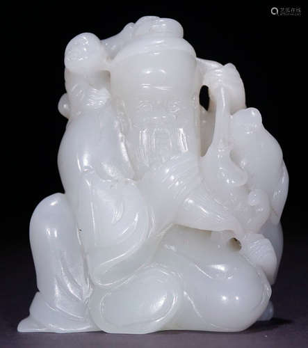 A HETIAN JADE CARVED CHILD SHAPE PENDANT