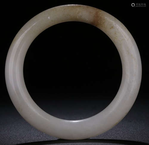 A HETIAN JADE CARVED BANGLE