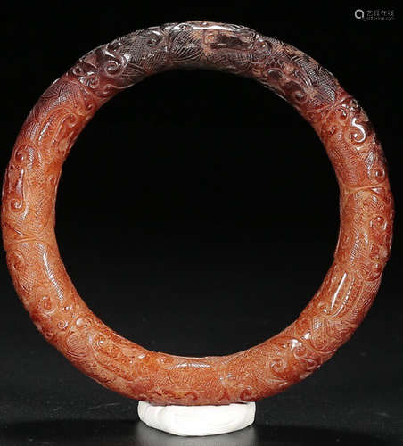 A HETIAN JADE CARVED BANGLE