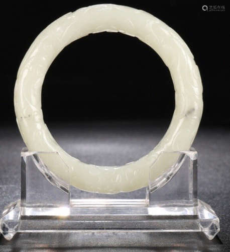 A HETIAN JADE CARVED BANGLE