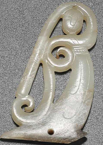 A HETIAN JADE CARVED FIGURE SHAPED PENDANT