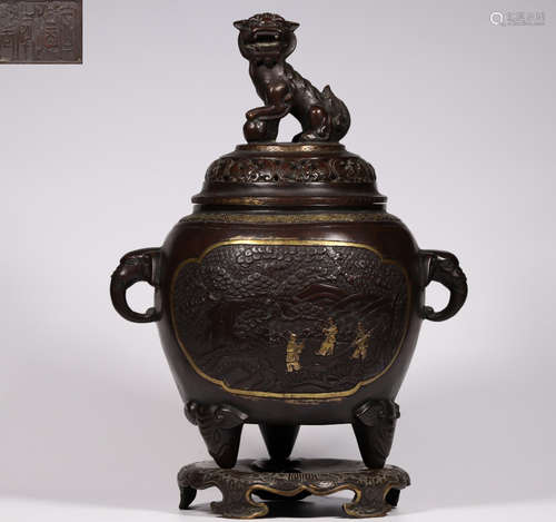 A COPPER CAST FIGURE PATTERN TRIPOD CENSER