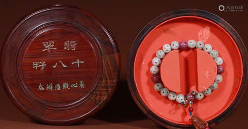 A JADEITE STRING BRACELET