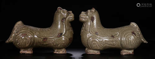 PAIR OF XIANGZHOU YAO CELADON GLAZE LION STATUES