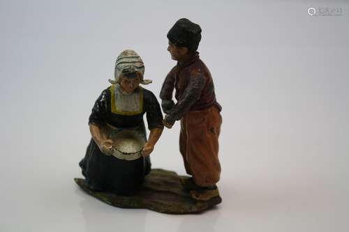 Pair of antique cold painted spelter Dutch figures on base.