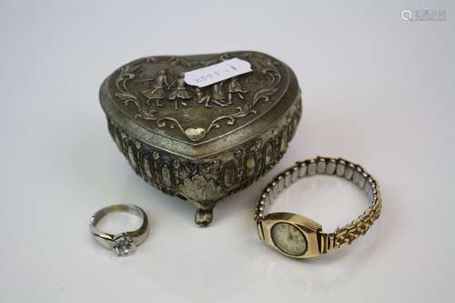 A small heart shaped white metal jewellery box together with a 9ct gold cased ladies watch and a