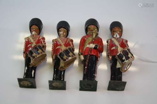 Collection of four vintage Scots Guards band leader & Military marching drummer figures.