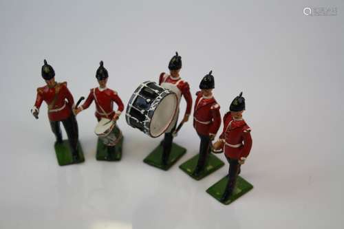 Five Britains lead toy marching band members soldiers.