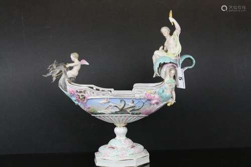 Continental Porcelain Boat Shaped Centrepiece Pedestal Bowl with dragon prow ridden by a cherub